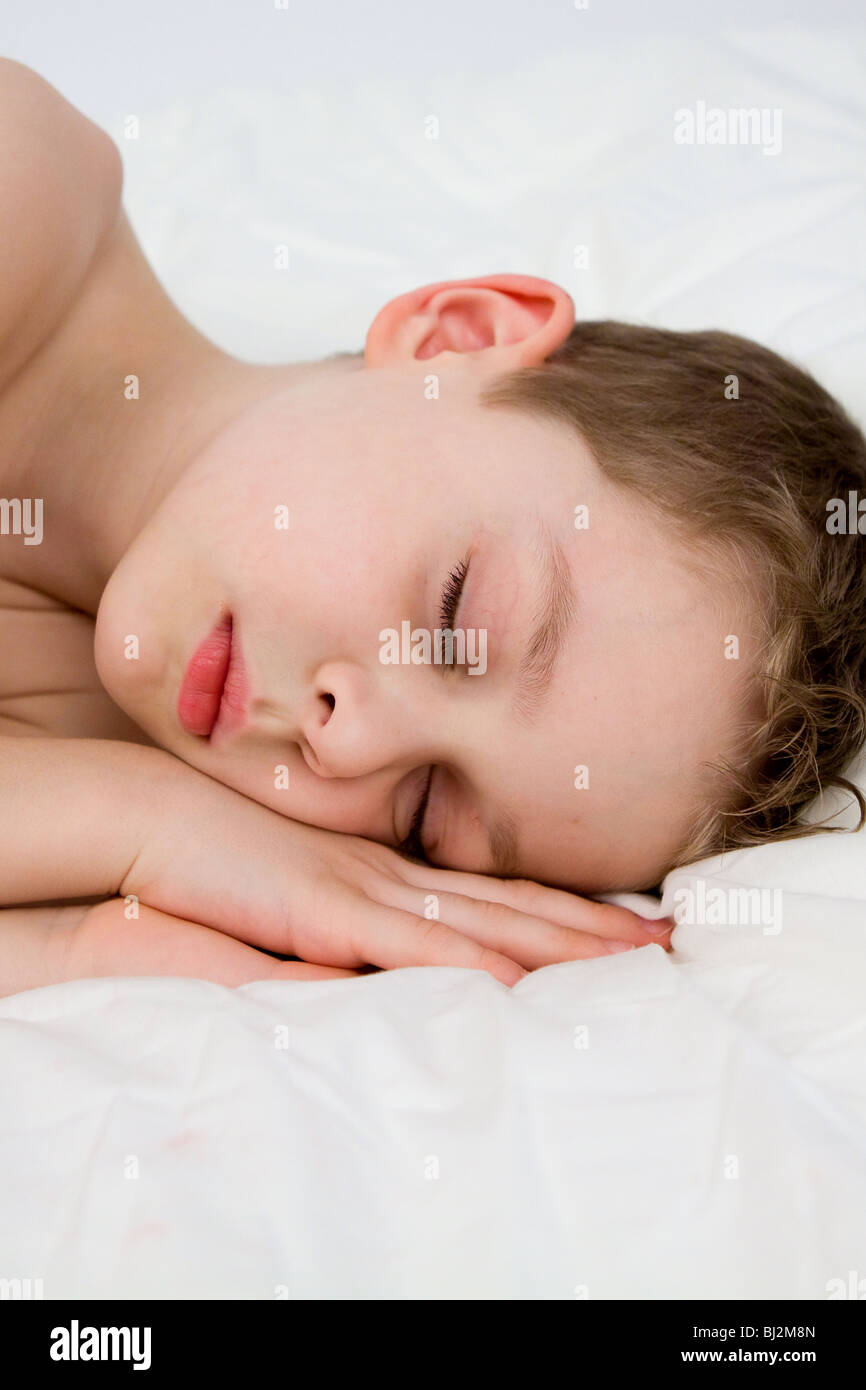 Cute caucasian boy sleeping hi-res stock photography and images - Alamy
