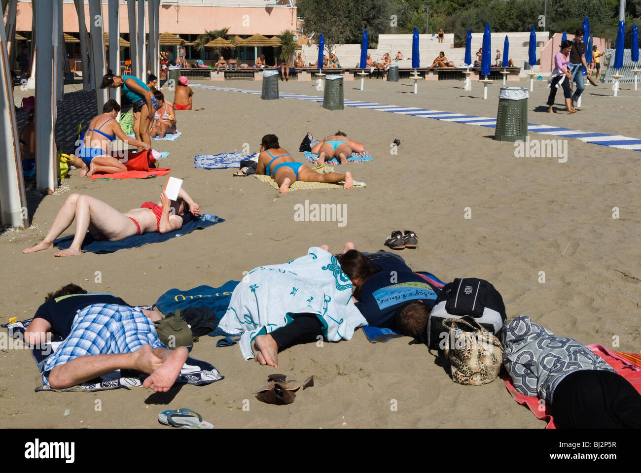 Venice Italy. Venice Lido public beach young people, the morning Stock
