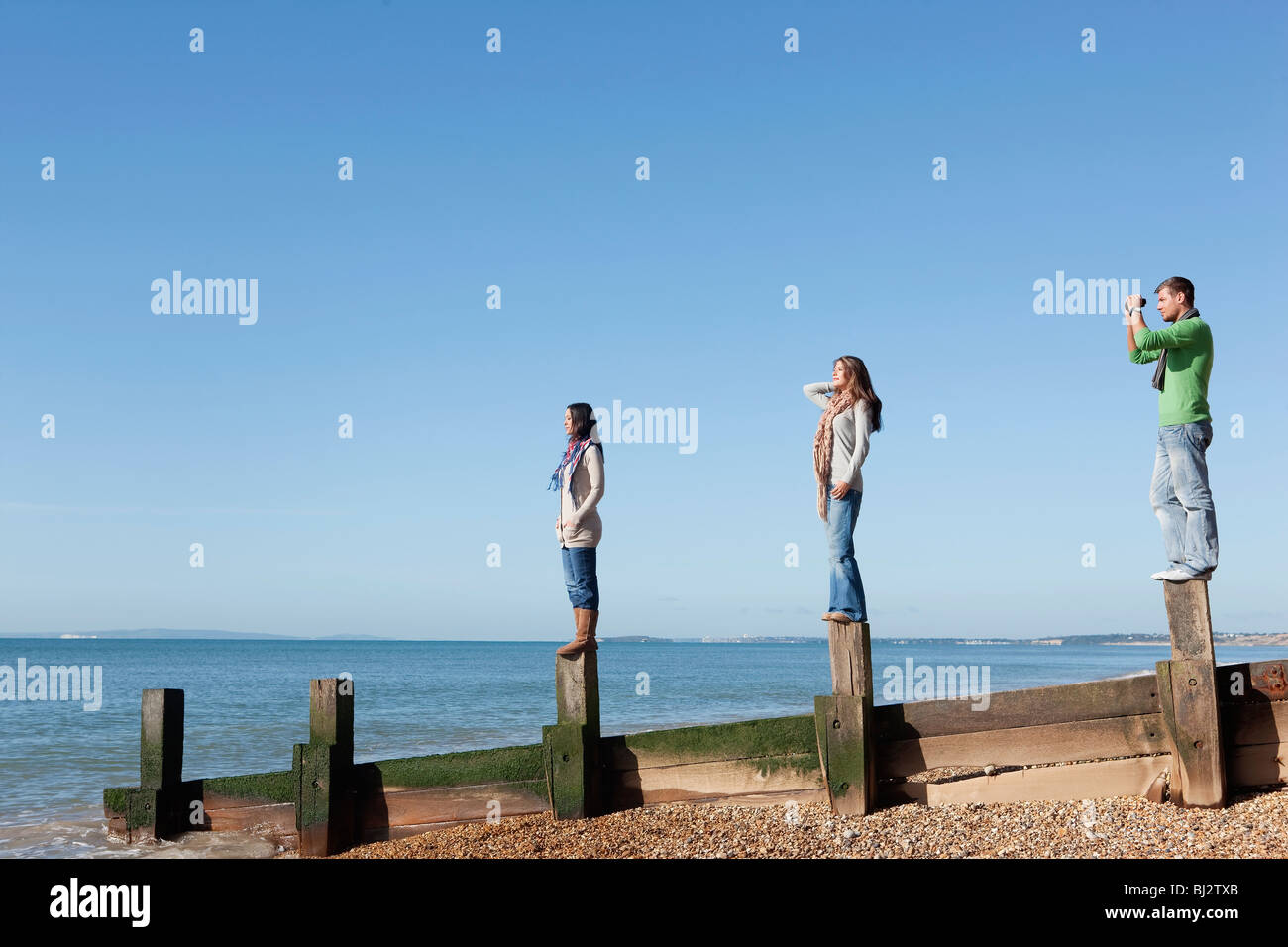 People looking out to sea Stock Photo Alamy