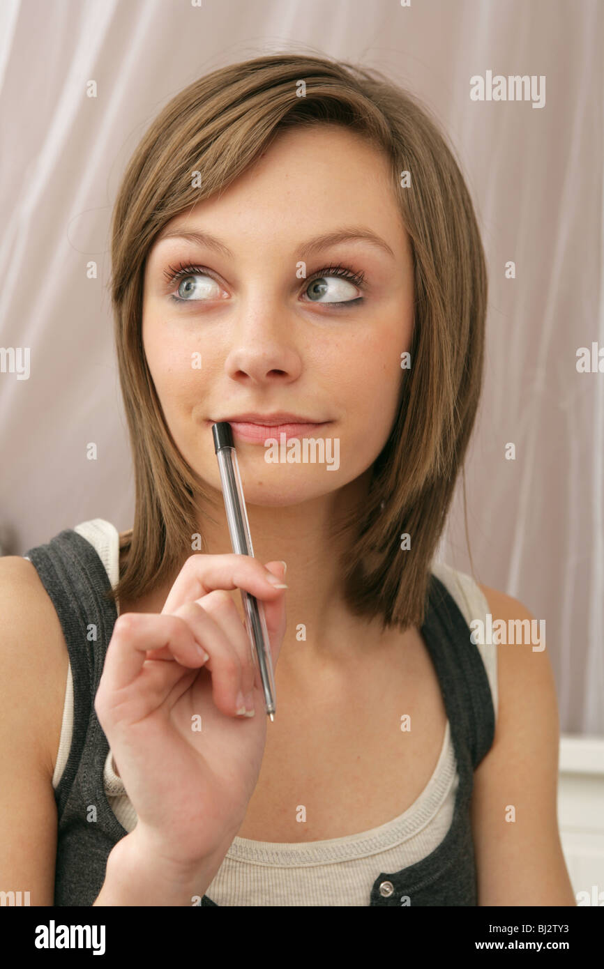 Pretty 14 year old girl thinking . Stock Photo