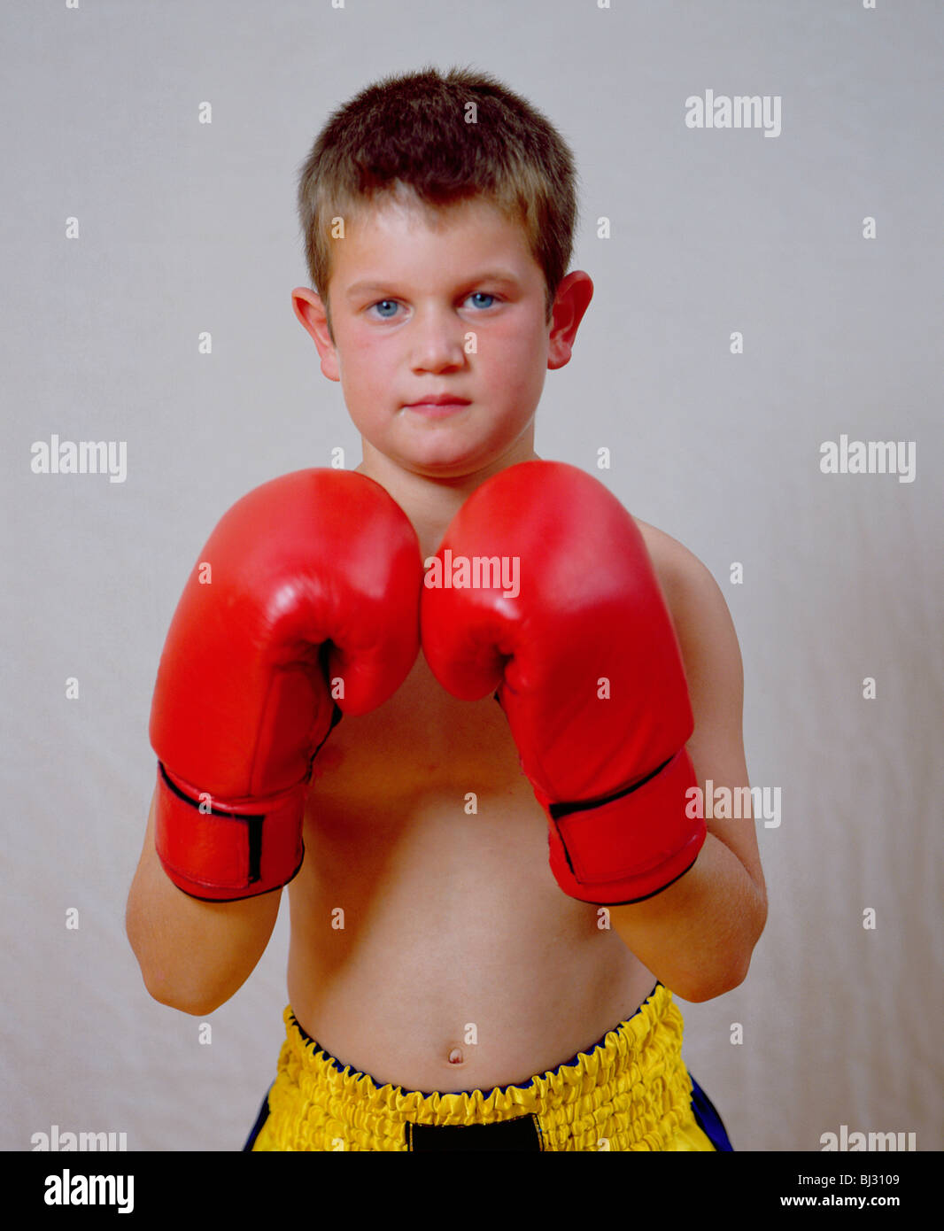 young boy in boxing outfit Stock Photo Alamy