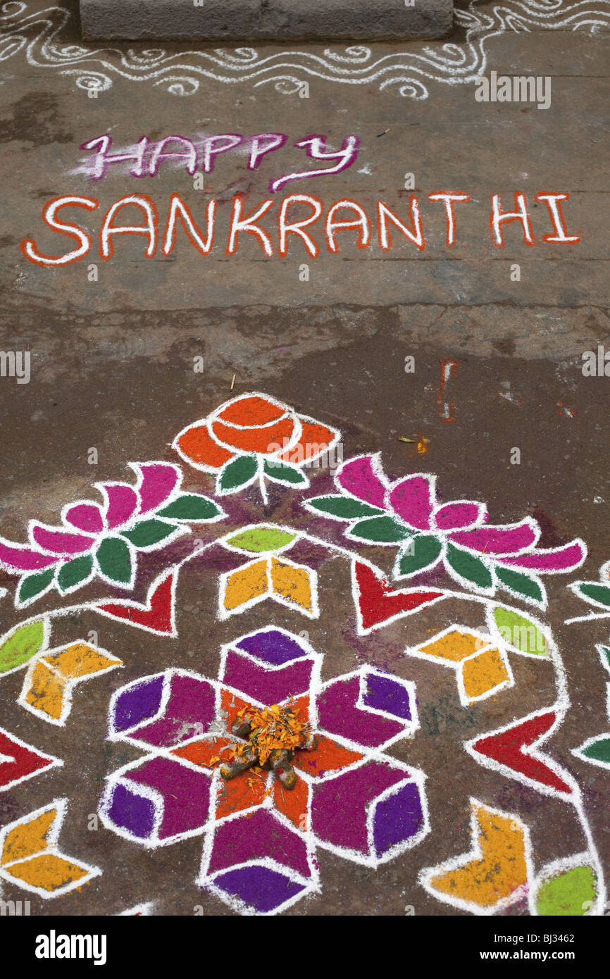 Rangoli festival designs in an Indian street made at the Hindu festival of Sankranthi or Pongal. Stock Photo