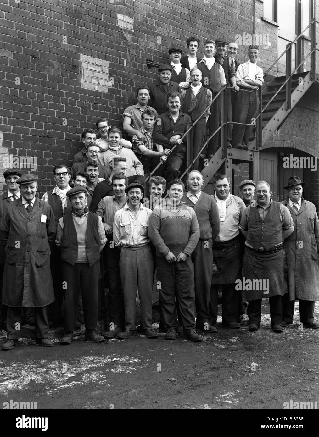 Group portrait of workers, Edgar Allen's steel foundry, Sheffield, South Yorkshire, 1963. Artist: Michael Walters Stock Photo