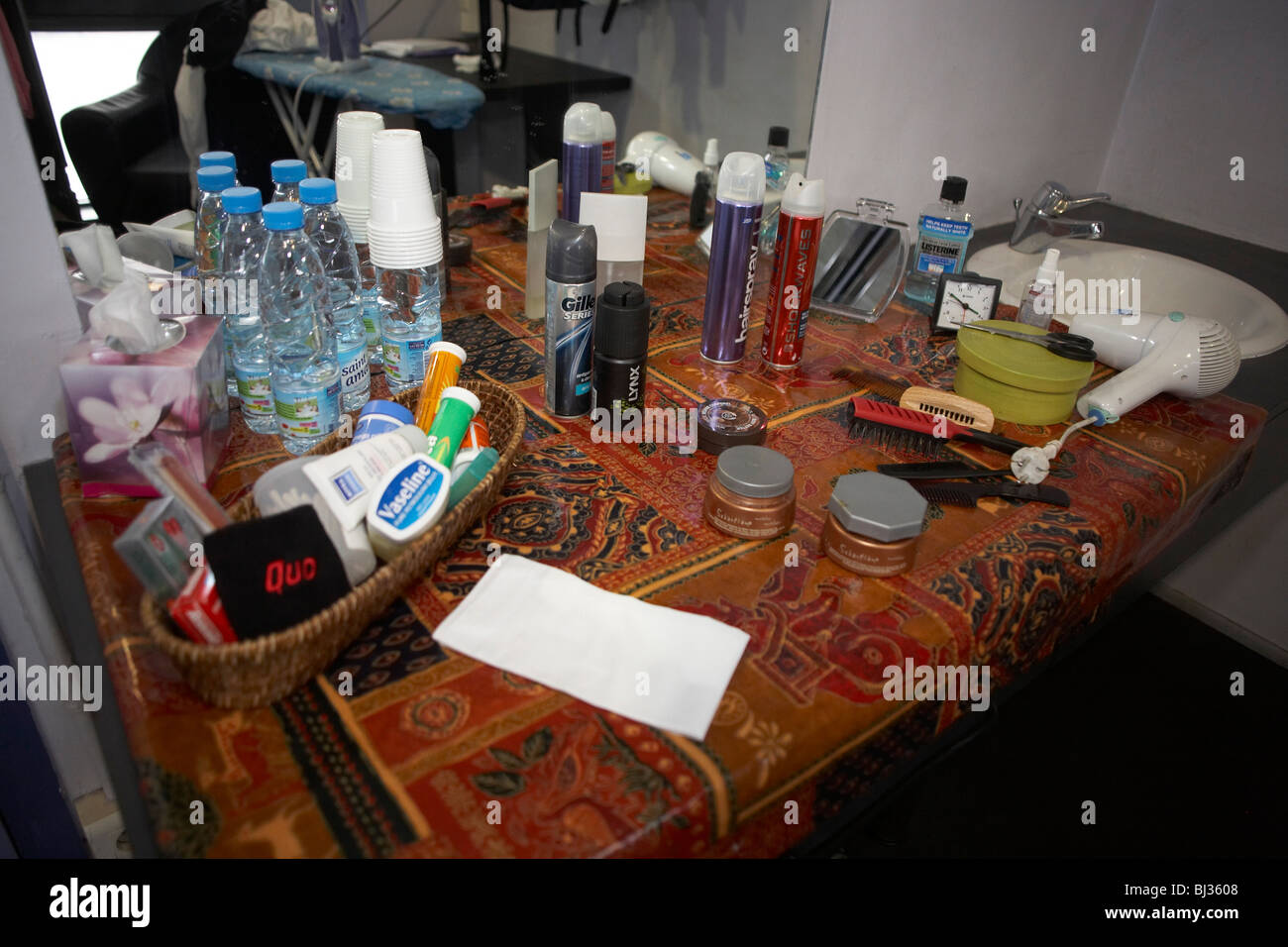 Personal effects belonging to the rock guitarist Francis Rossi of Status Quo is seen laid out on a dressing room Stock Photo