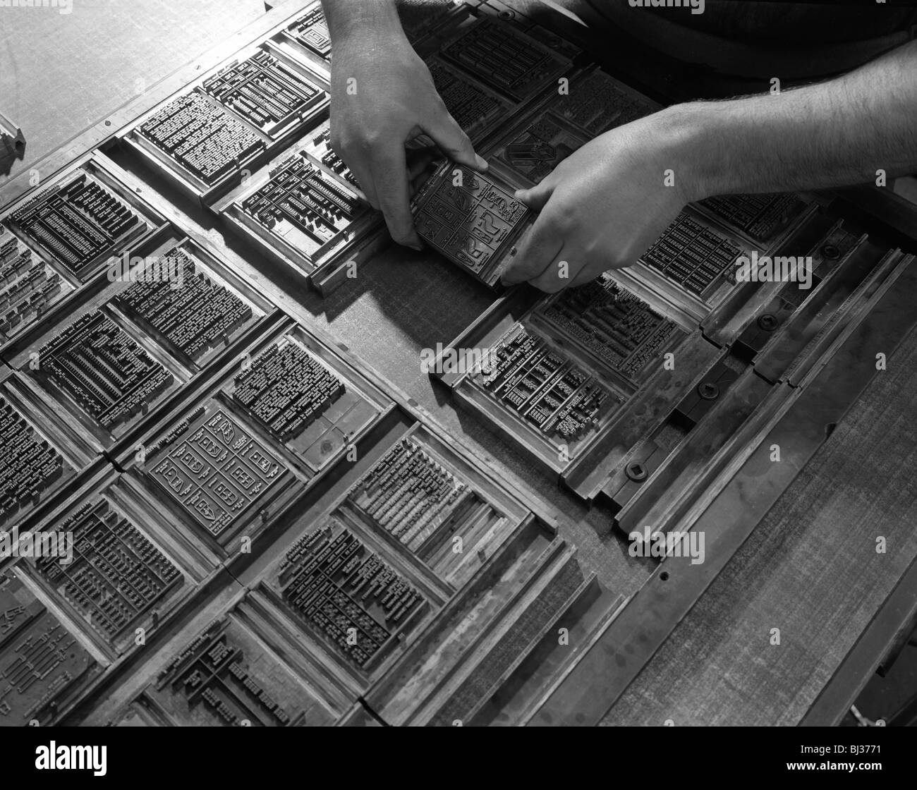 Linotype block being set in the dye at a printworks, Mexborough, South Yorkshire, 1959. Artist: Michael Walters Stock Photo