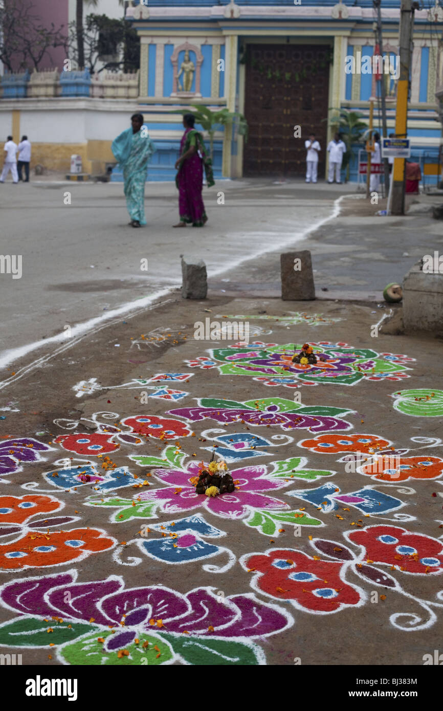 Rangoli festival designs in an Indian street made at the Hindu festival of Sankranthi or Pongal. Stock Photo