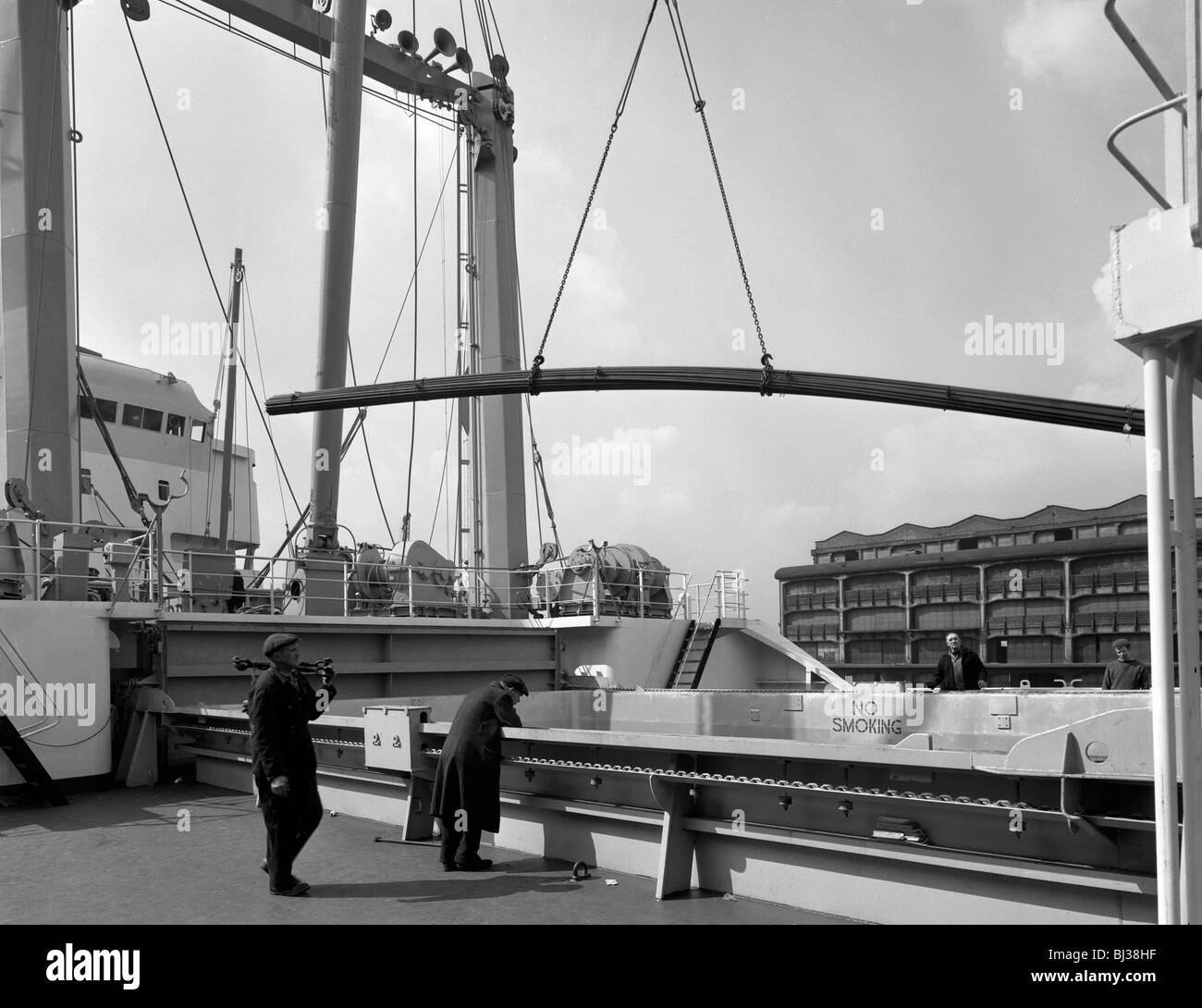 Steel bars being loaded onto the 'Manchester Renown', Manchester, 1964