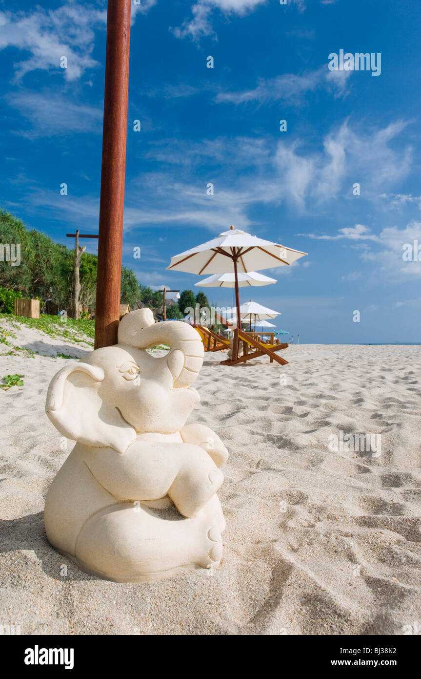 Small elephant as a parasol stand, sandy beach, Klong Nin Beach, Ko Lanta or Koh Lanta island, Krabi, Thailand, Asia Stock Photo