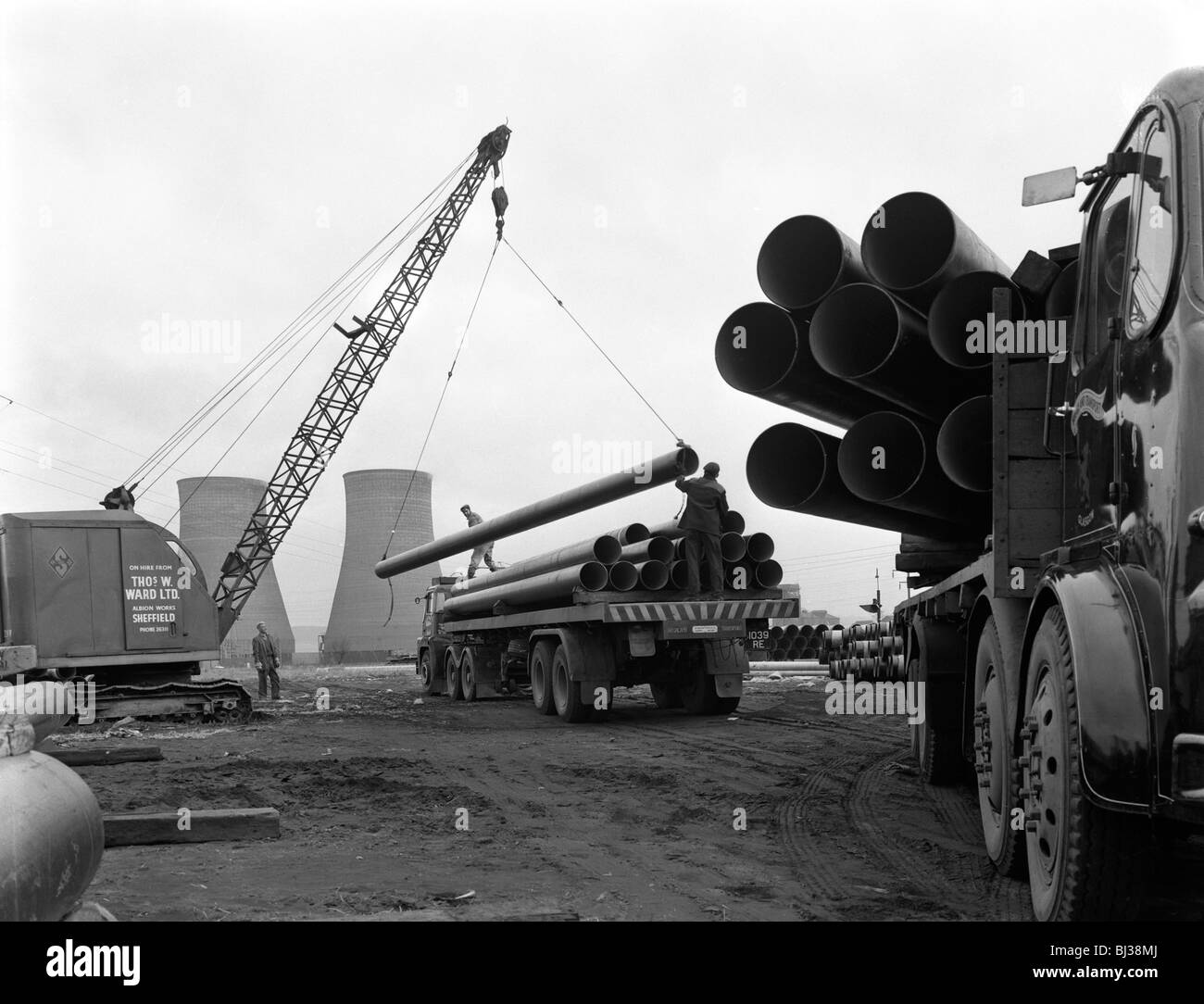 Pipe wrapping to prevent corrosion on steel pipes, Old Denaby, South Yorkshire, 1961. Artist: Michael Walters Stock Photo