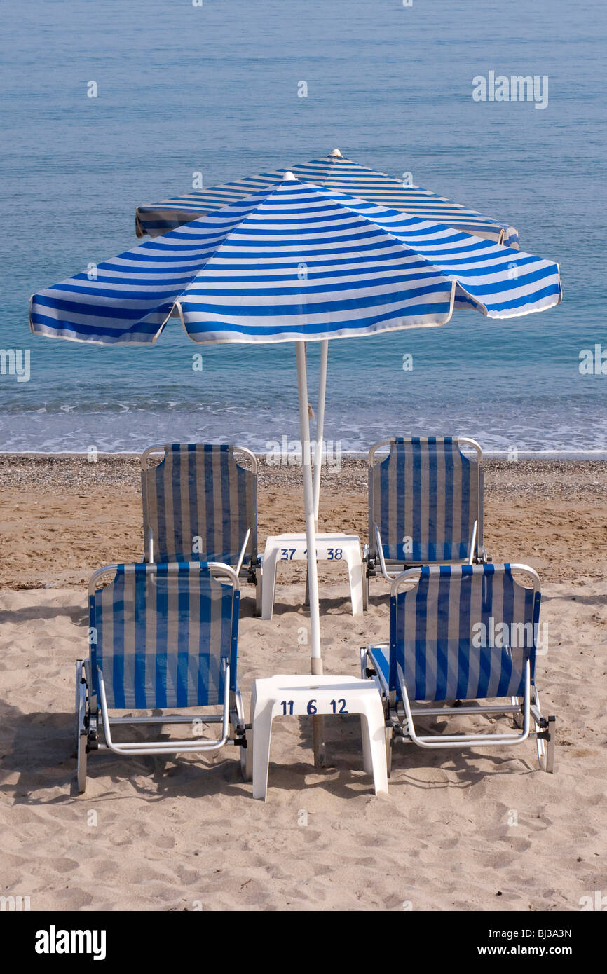 Beach with sunshades near Rethimno, Crete, Greece, Europe Stock Photo
