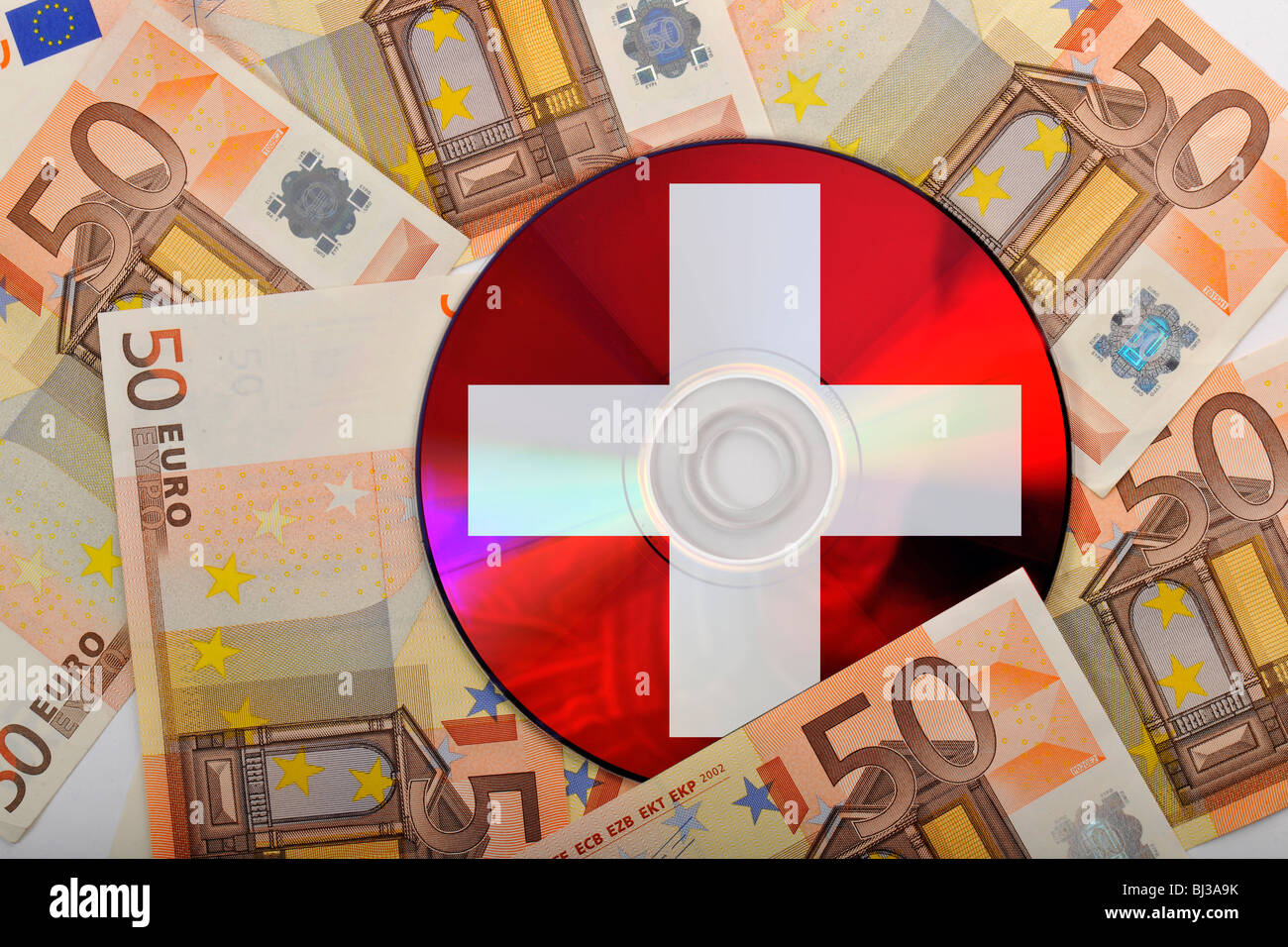 DVD, CD, euro bills, national flag of Switzerland, symbolic image for