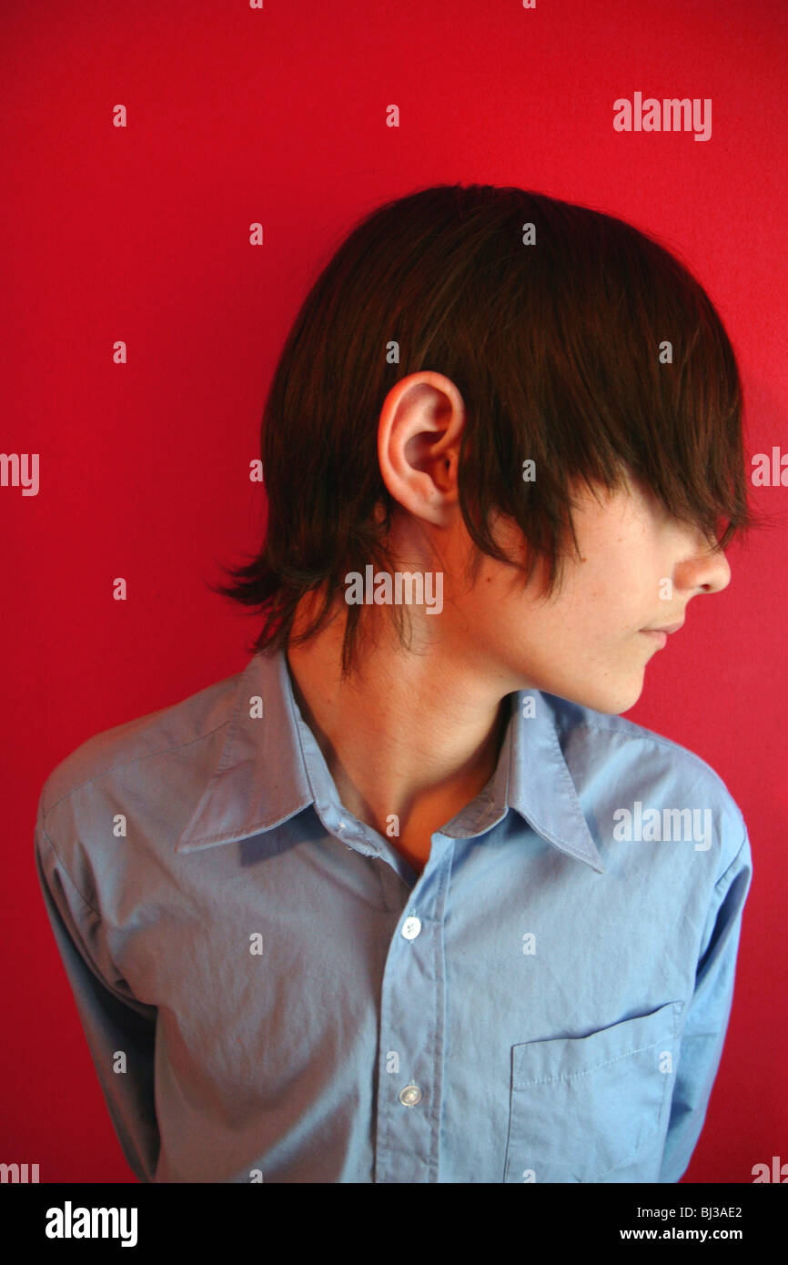 A 13 year old boy looking away, with his ear showing Stock Photo Alamy