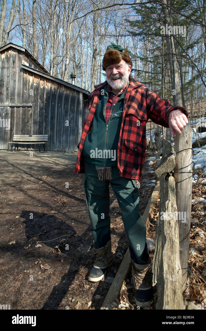 Farmer at Forest Food Production and Maple Syrup or Maple syrup Harvest