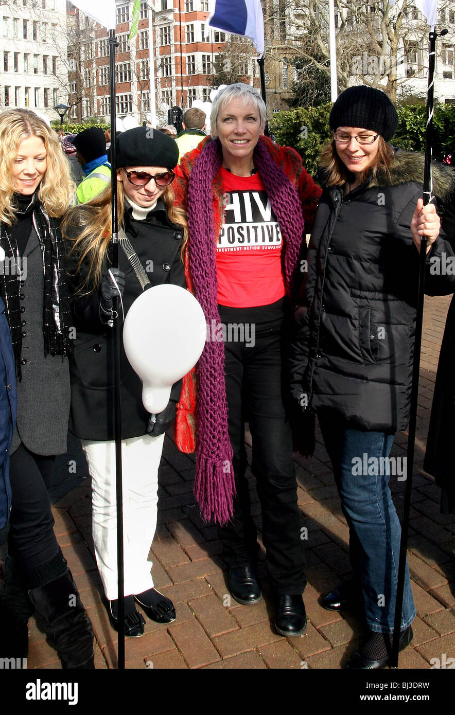 Annie Lennox (c) promotes HIV Positive in London as part of the International Women's Day celebrations Stock Photo