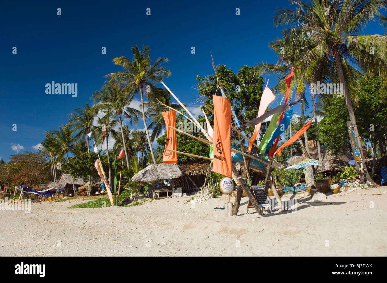 Colorful flags on the palm beach, Where Else Resort, Klong Khong Beach, Ko Lanta or Koh Lanta island, Krabi, Thailand, Asia Stock Photo