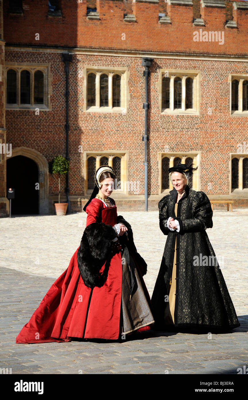 Tutor ladies in the Base Court of Hampton Court, London, UK Stock Photo