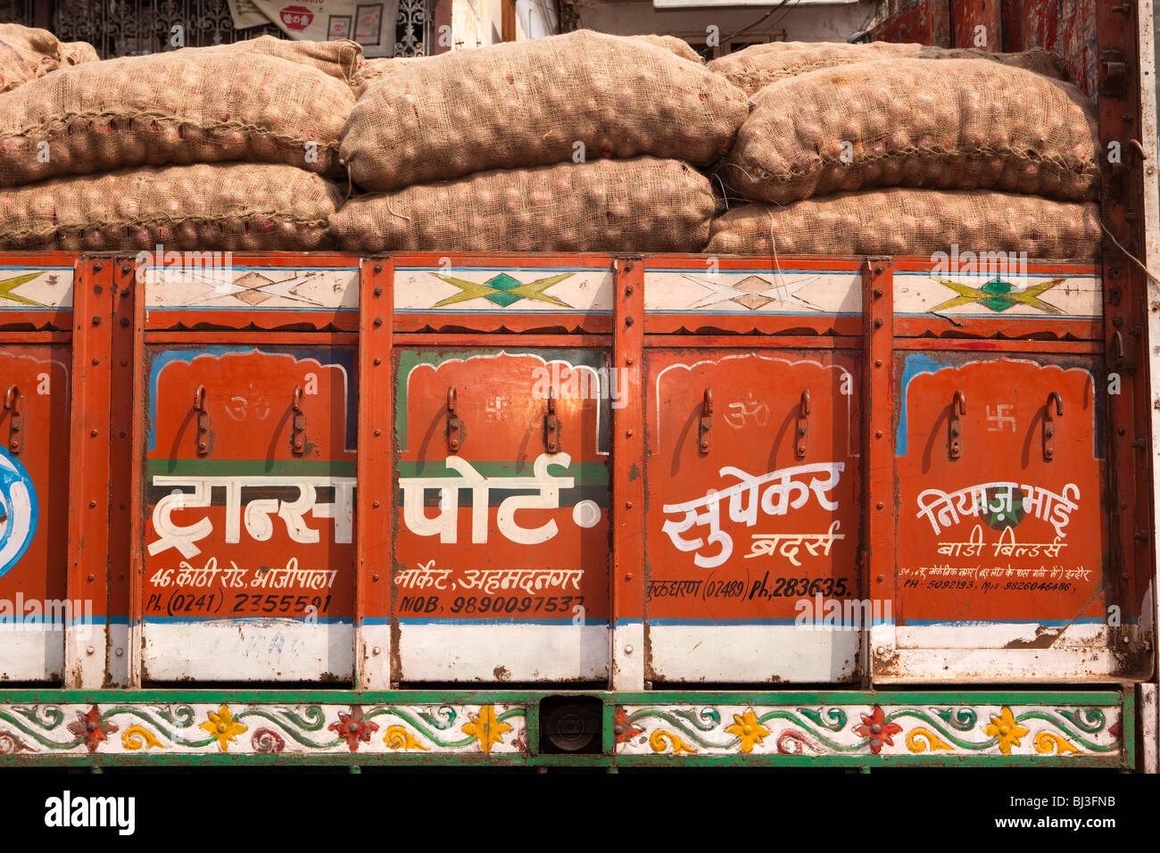 India, Kerala, Calicut, Kozhikode, Big Bazaar, decorated side of truck carrying onions from Maharashtra Stock Photo