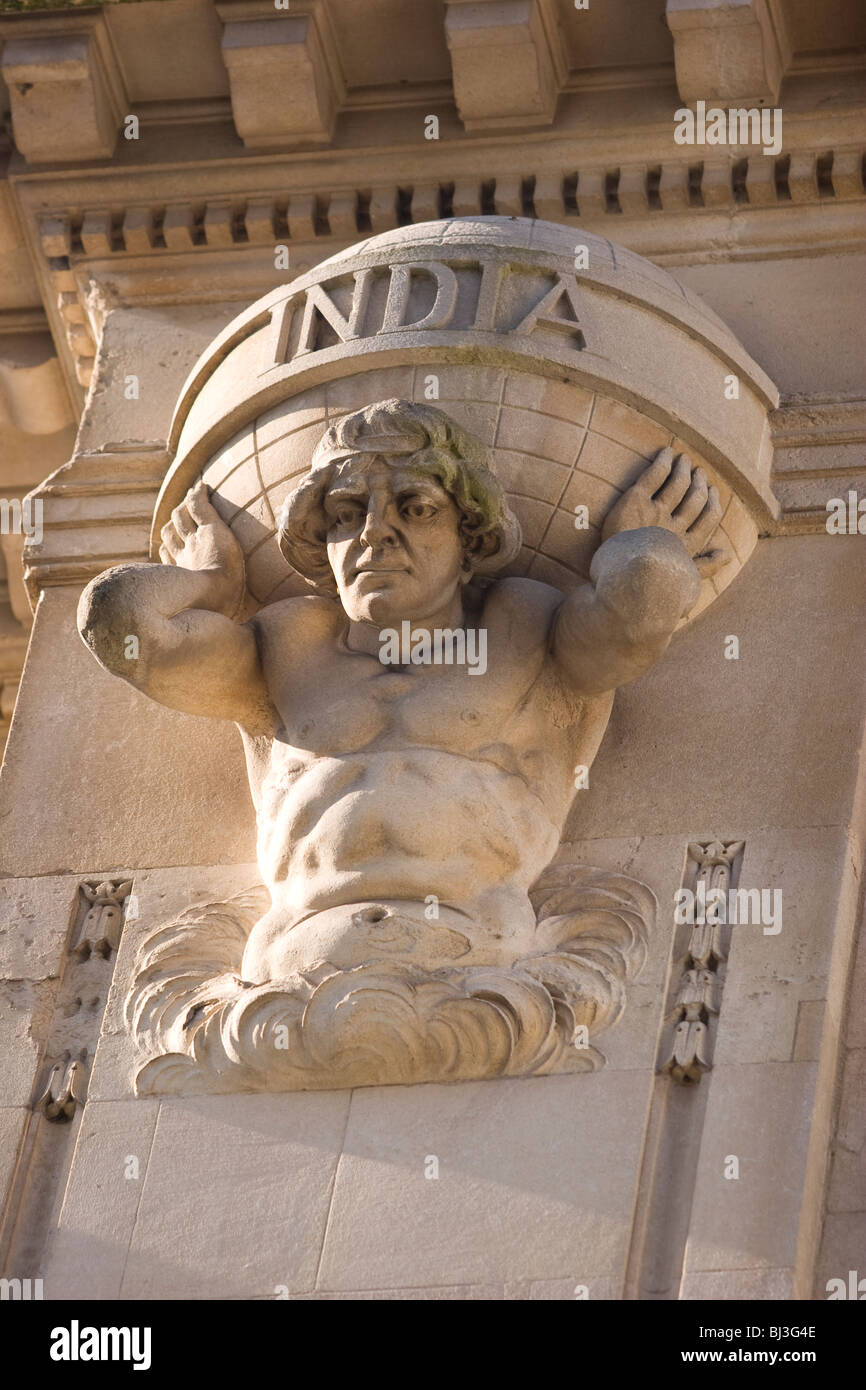 Commonwealth House, Whiteladies Road, Bristol, England: Atlas holding up the world, with the word: INDIA. Stock Photo