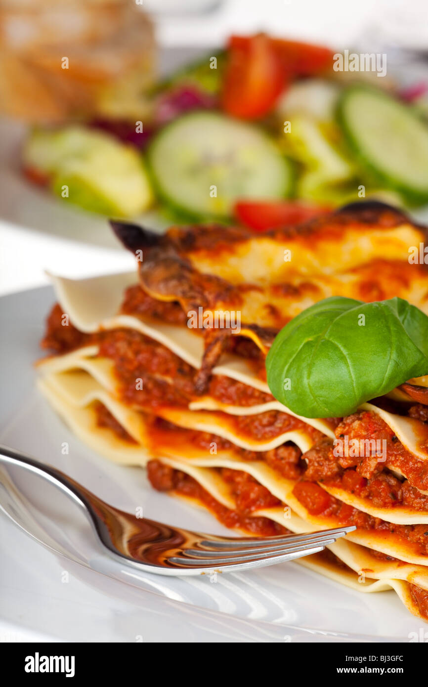 lasagna noodle dish on a white plate Stock Photo