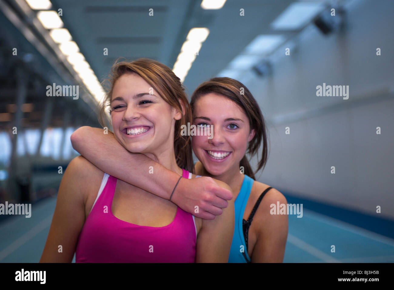 Female athletes hugging hires stock photography and images Alamy