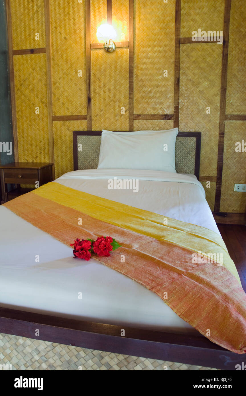 Bed in a bamboo bungalow, The Narima Resort, Klong Nin Beach, Ko Lanta or Koh Lanta island, Krabi, Thailand, Asia Stock Photo