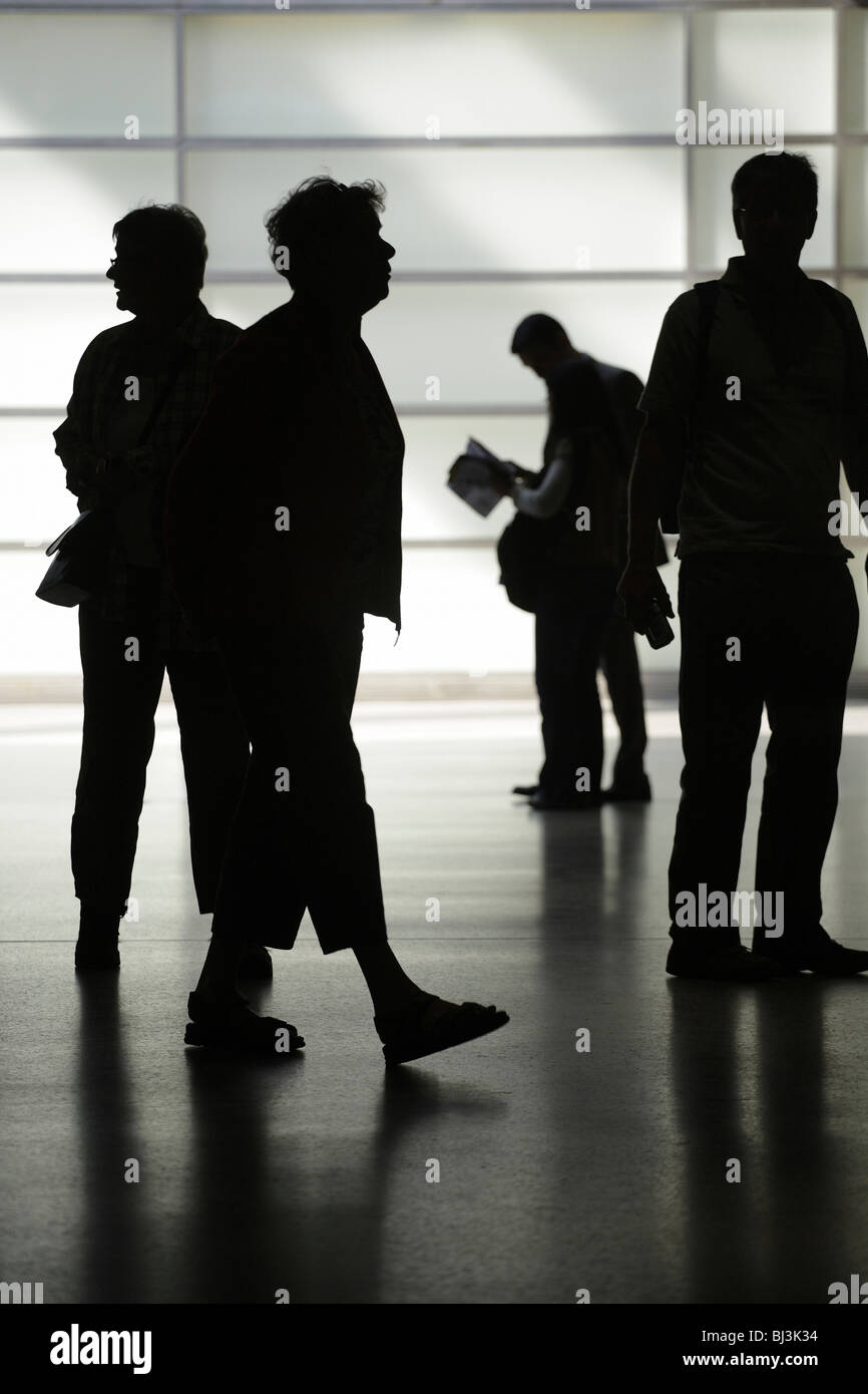 Silhouette of people passing by Stock Photo - Alamy