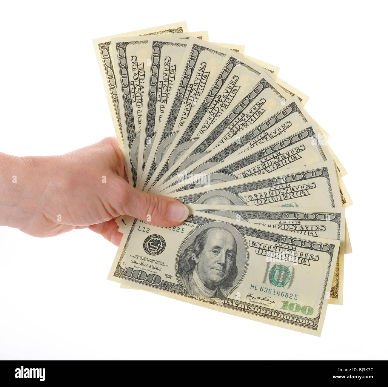 Hand, fan, several 100-dollar bills Stock Photo