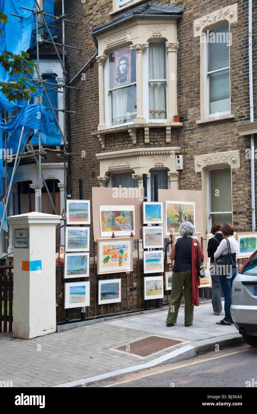 People & paintings in London's largest annual outdoor street Urban Art