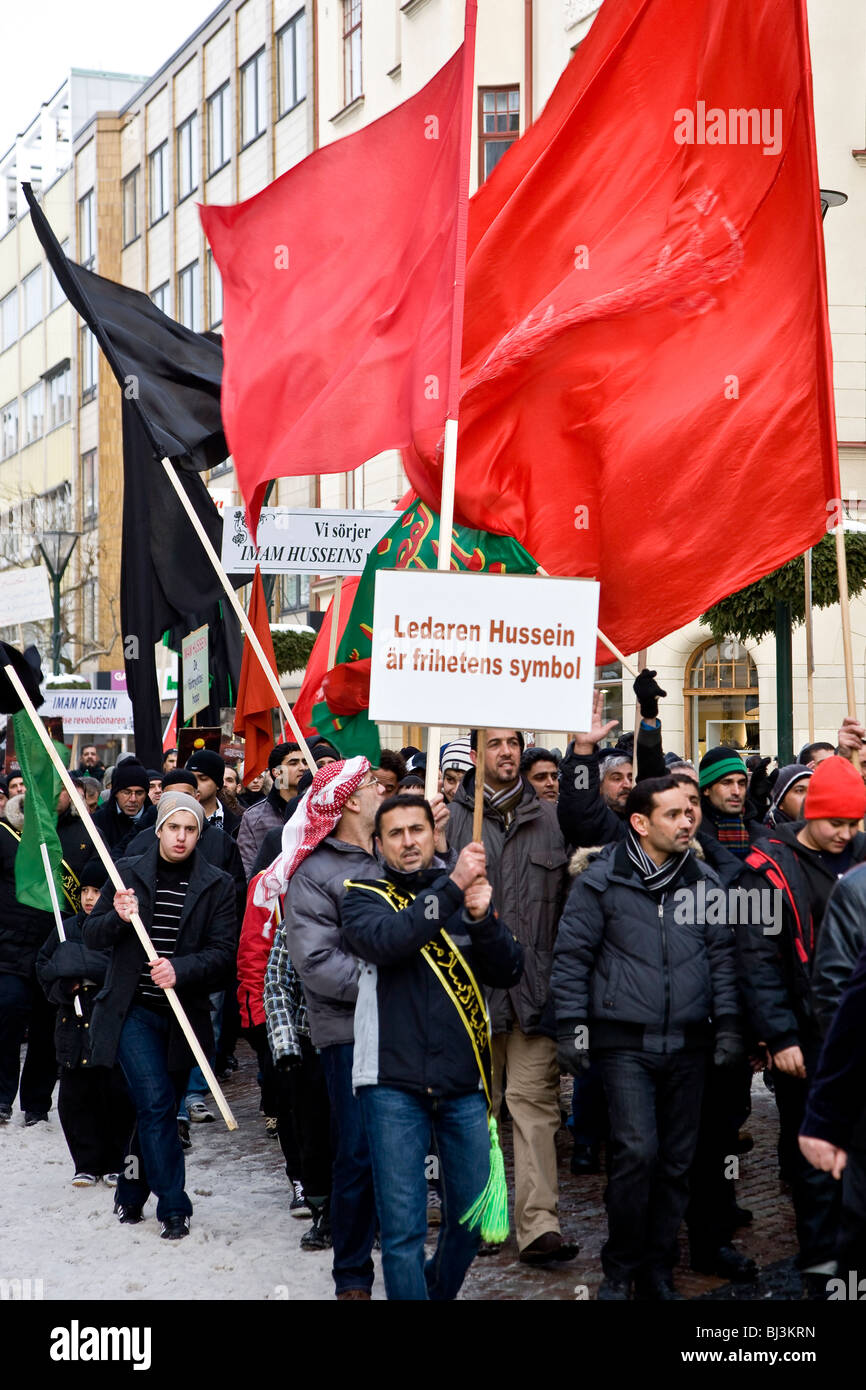 Men walking the Imam Hussein Memorial March in Malmo, Sweden, Europe Stock Photo