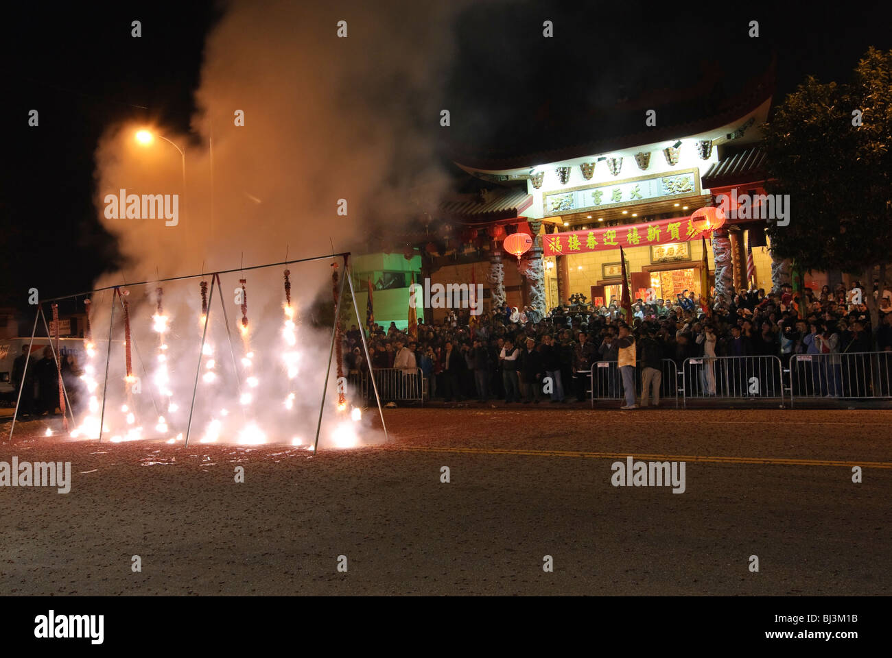 Firecrackers at night during the Chinese New Years Celebration. Stock Photo