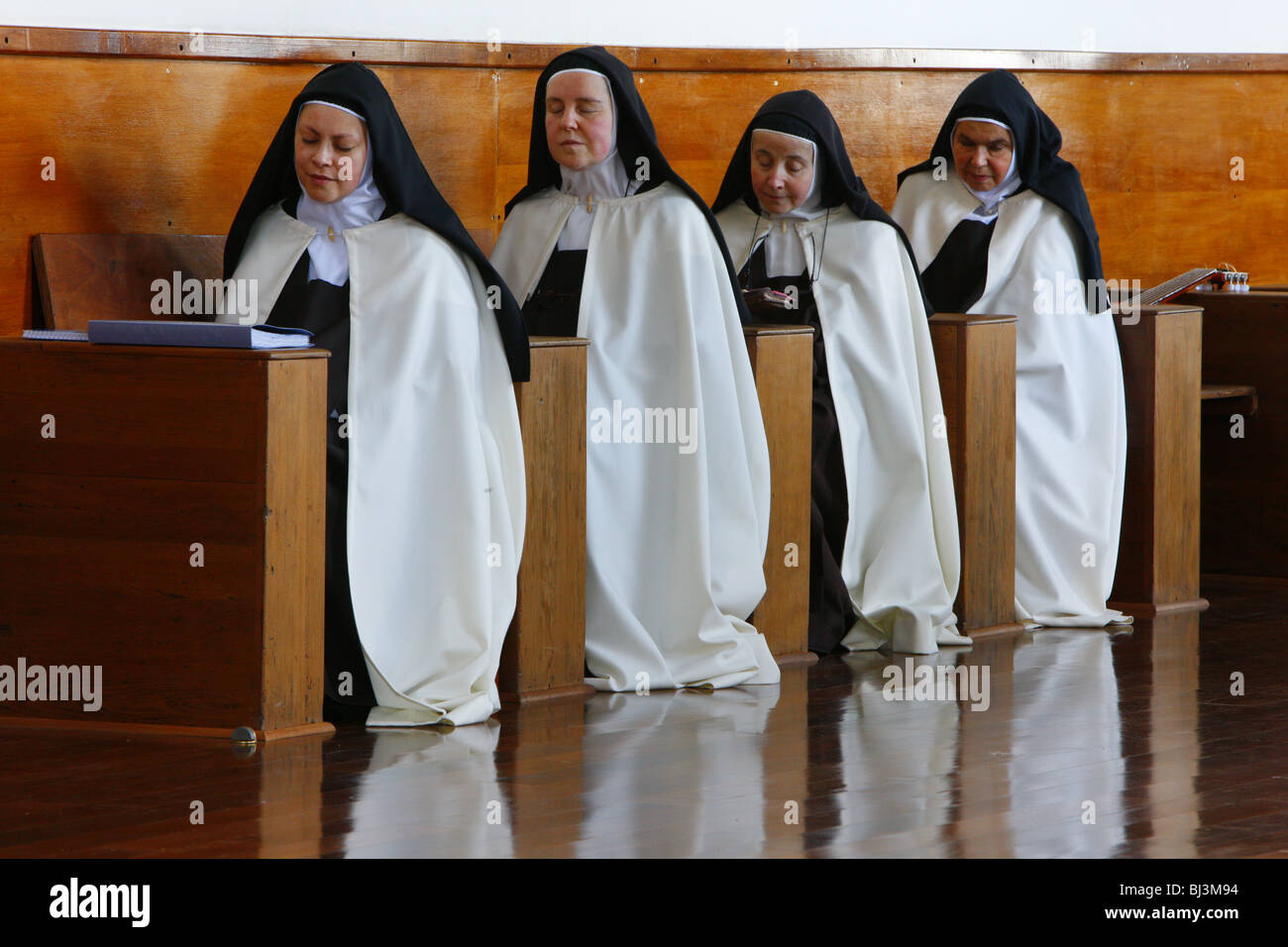 Nuns at devotions, Carmelite Monastery, Puerto Montt, Chile, South America Stock Photo