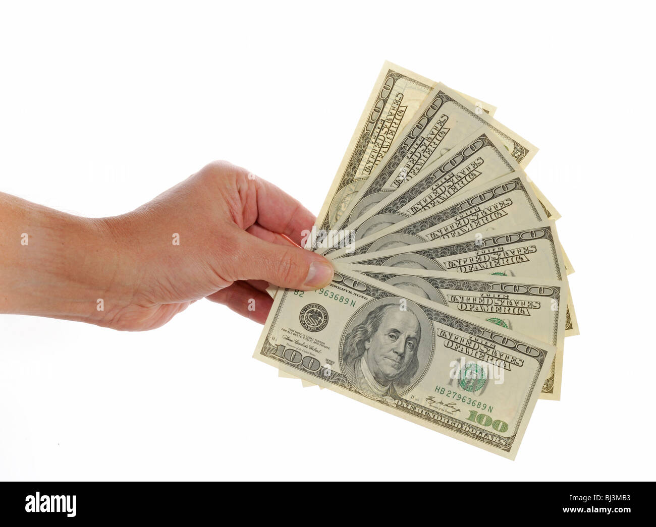 Hand, fan, several 100-dollar bills Stock Photo