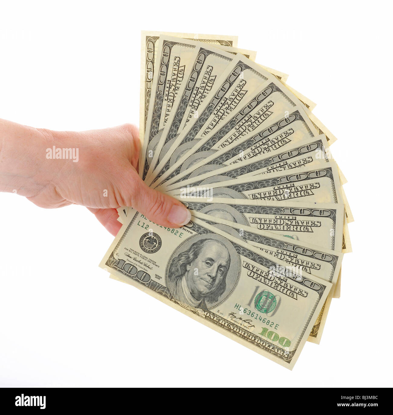 Hand, fan, several 100-dollar bills Stock Photo