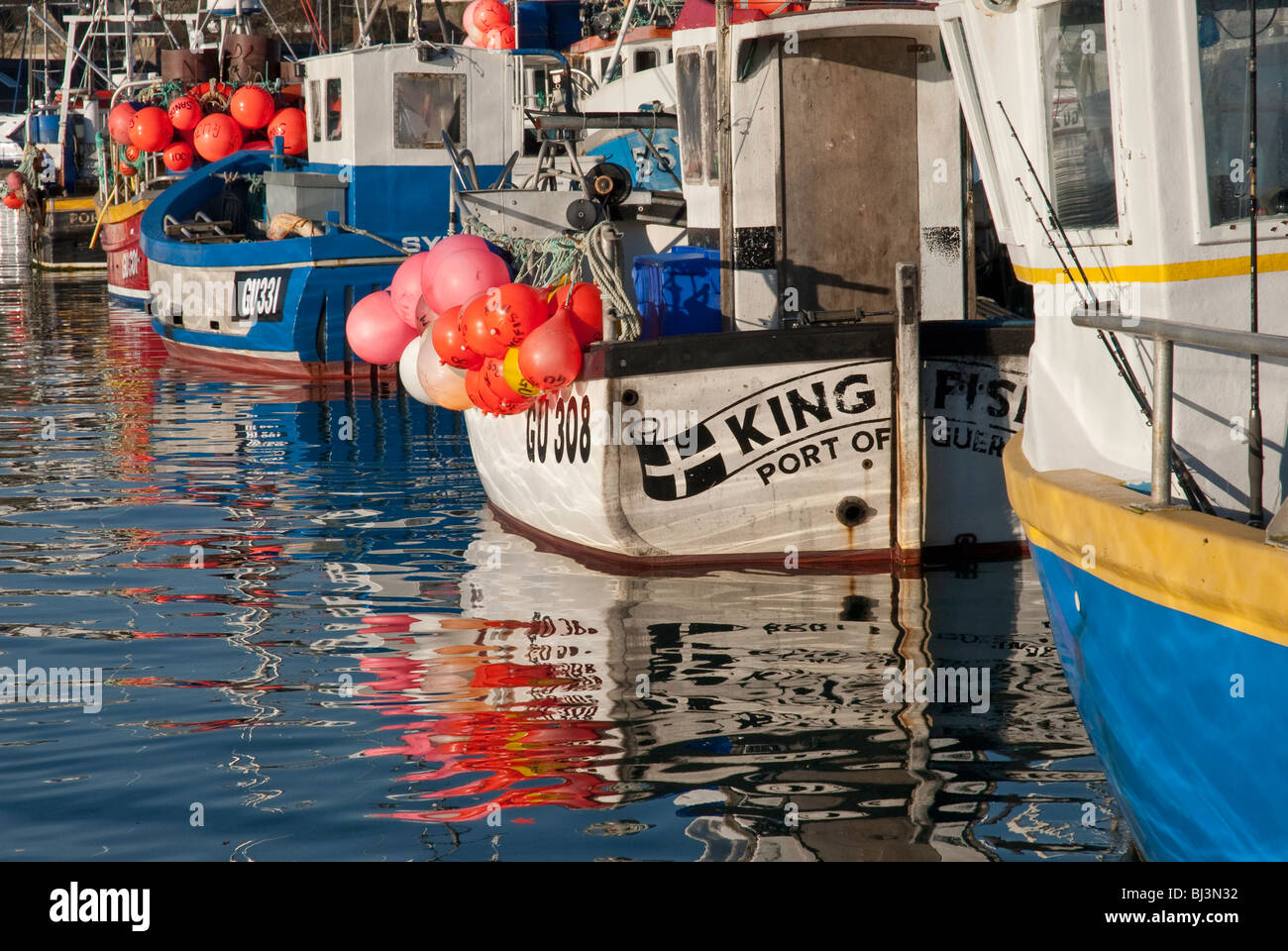 Fishing boats in St Peter Port harbour, Guernsey Stock Photo - Alamy