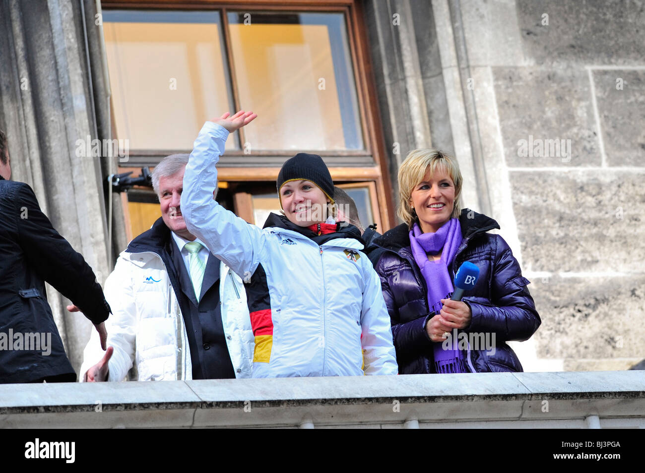 Magdalena Neuner and Horst Seehofer, on the Town Hall balcony, at the reception of the German Olympic participants 2010, Munich Stock Photo