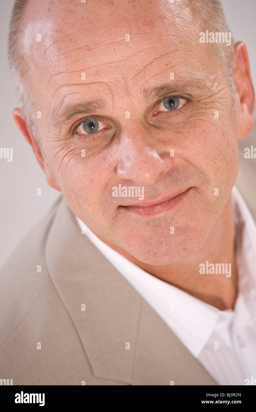 Smiling man with frontal baldness Stock Photo