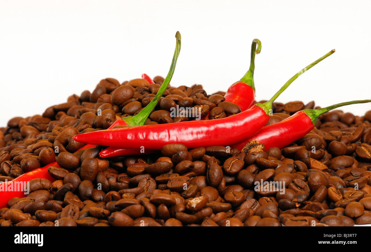 Chili peppers with coffee beans Stock Photo Alamy