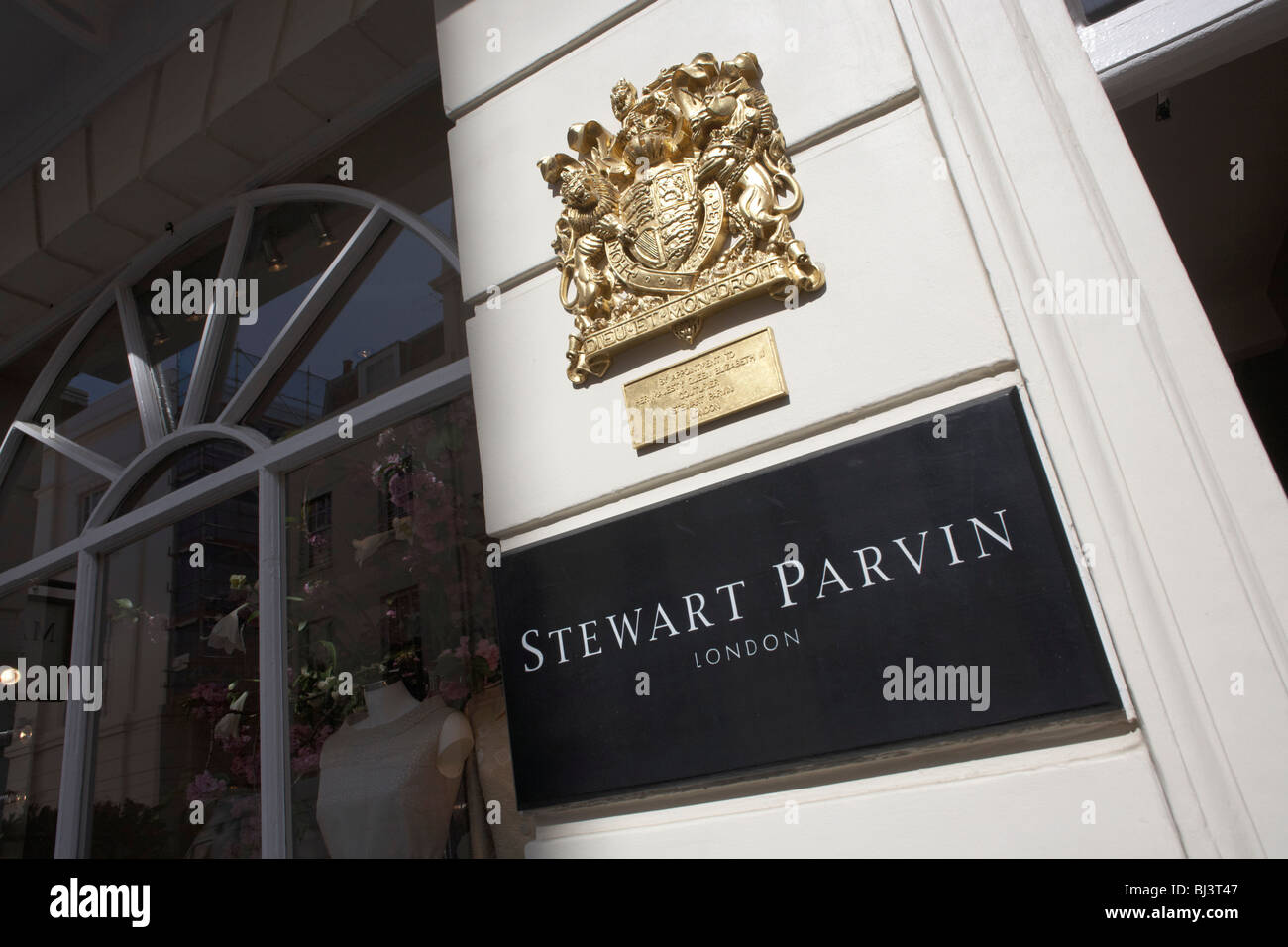 Prominent Royal Warrant as couturier to Her Majesty the Queen, the fashion house Stewart Parvin's boutique Stock Photo