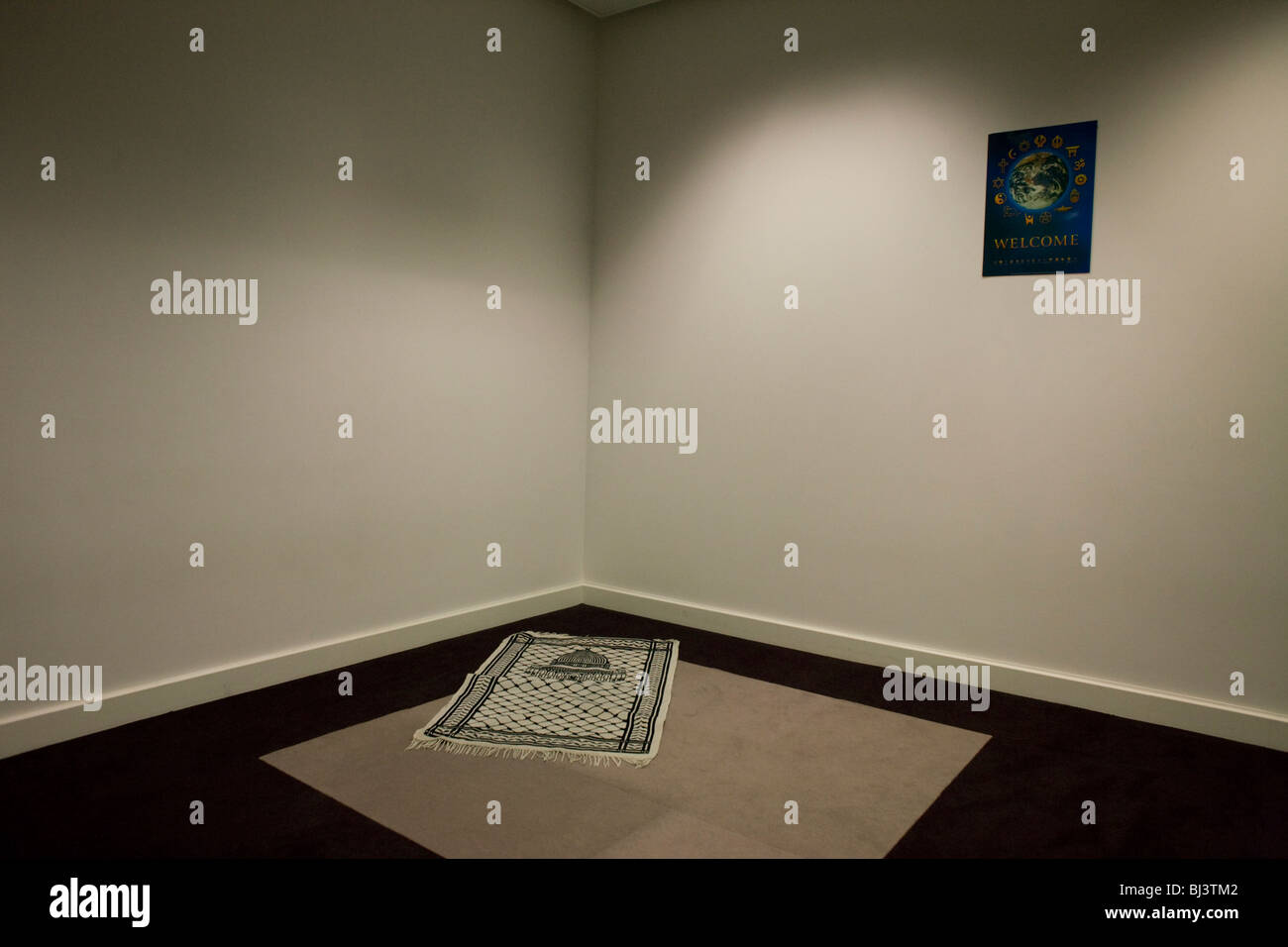 Islamic prayer mat in prayer room at Heathrow airport. Stock Photo