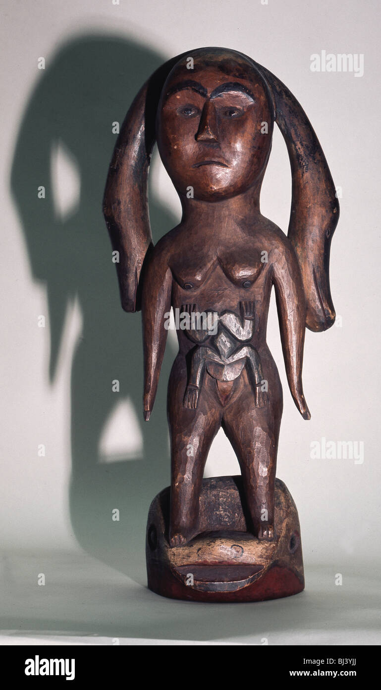 Carved wooden figure of a Sea Mother, possibly Kwakiutl, north-west coast of America. Artist: Werner Forman Stock Photo
