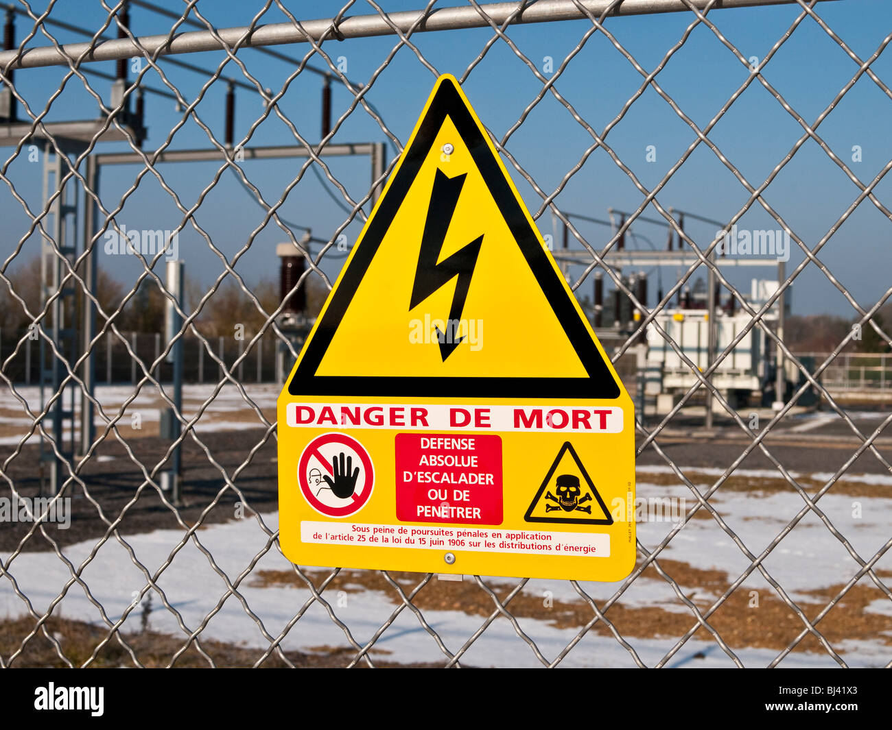 Warning notice at electricity sub-station - France. Stock Photo