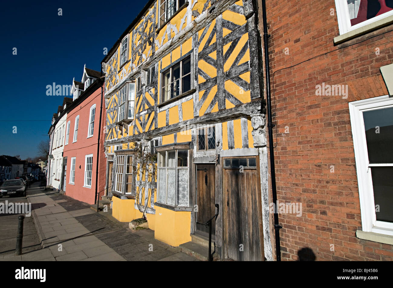 a yellow tudor timbered house in ludlow shropshire Stock Photo Alamy
