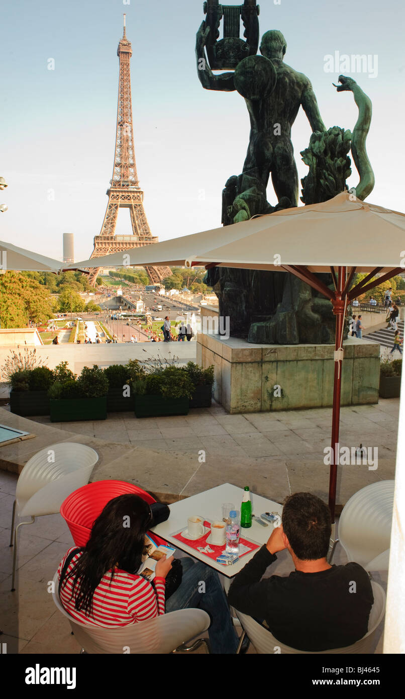 Paris, France, Couple from rear, in French Cafe/Bistro Restaurant, Sidewalk terrace in Trocadero, With View of Eiffel Tower, Romance, back Stock Photo