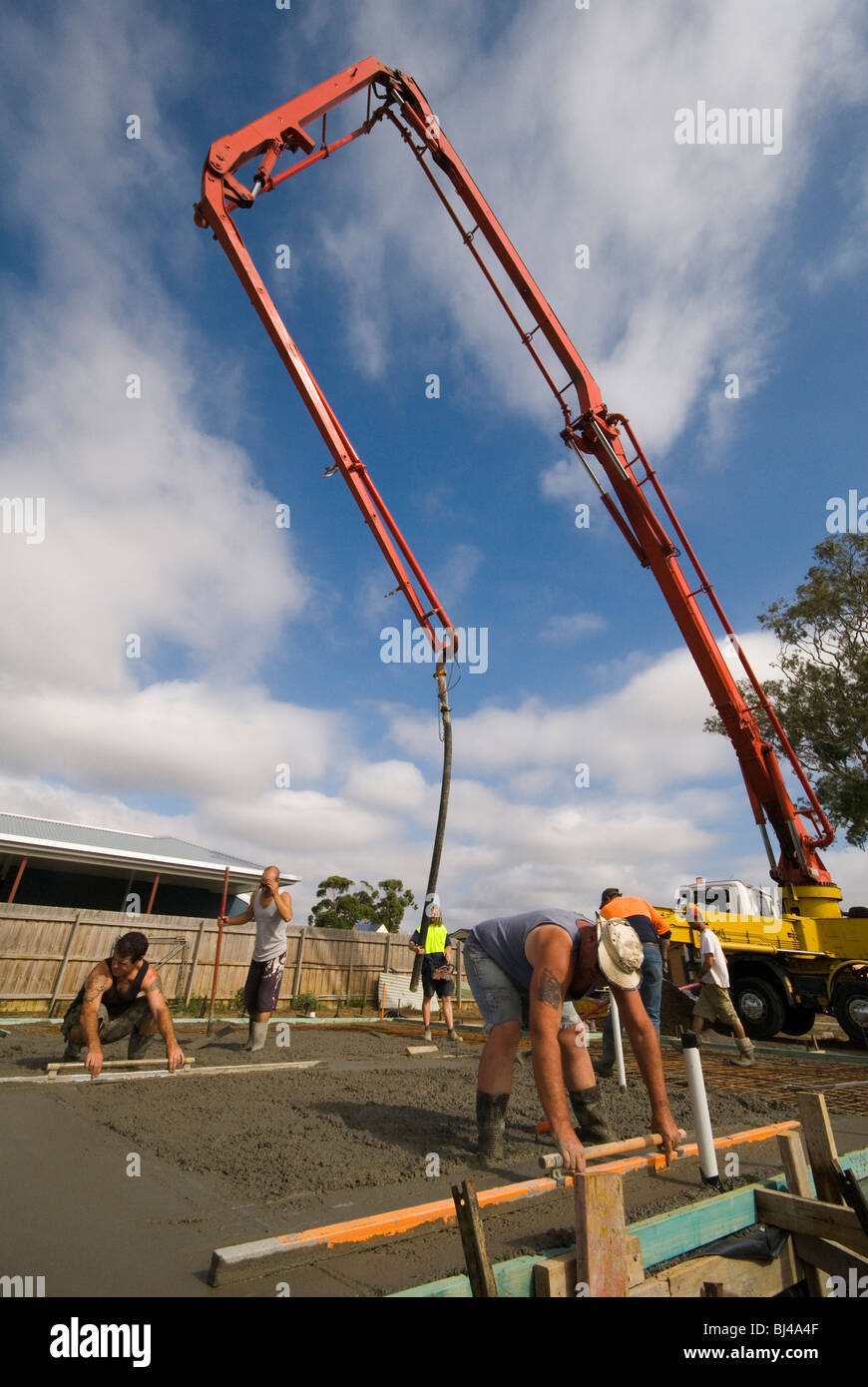 Workers finish concrete slab hi-res stock photography and images - Alamy