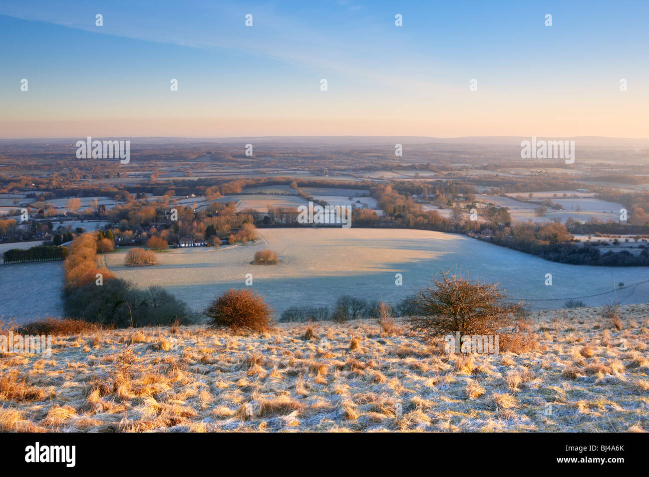 Looking northward on a frosty spring morning from the summit of Ditchling Beacon South Downs Stock Photo