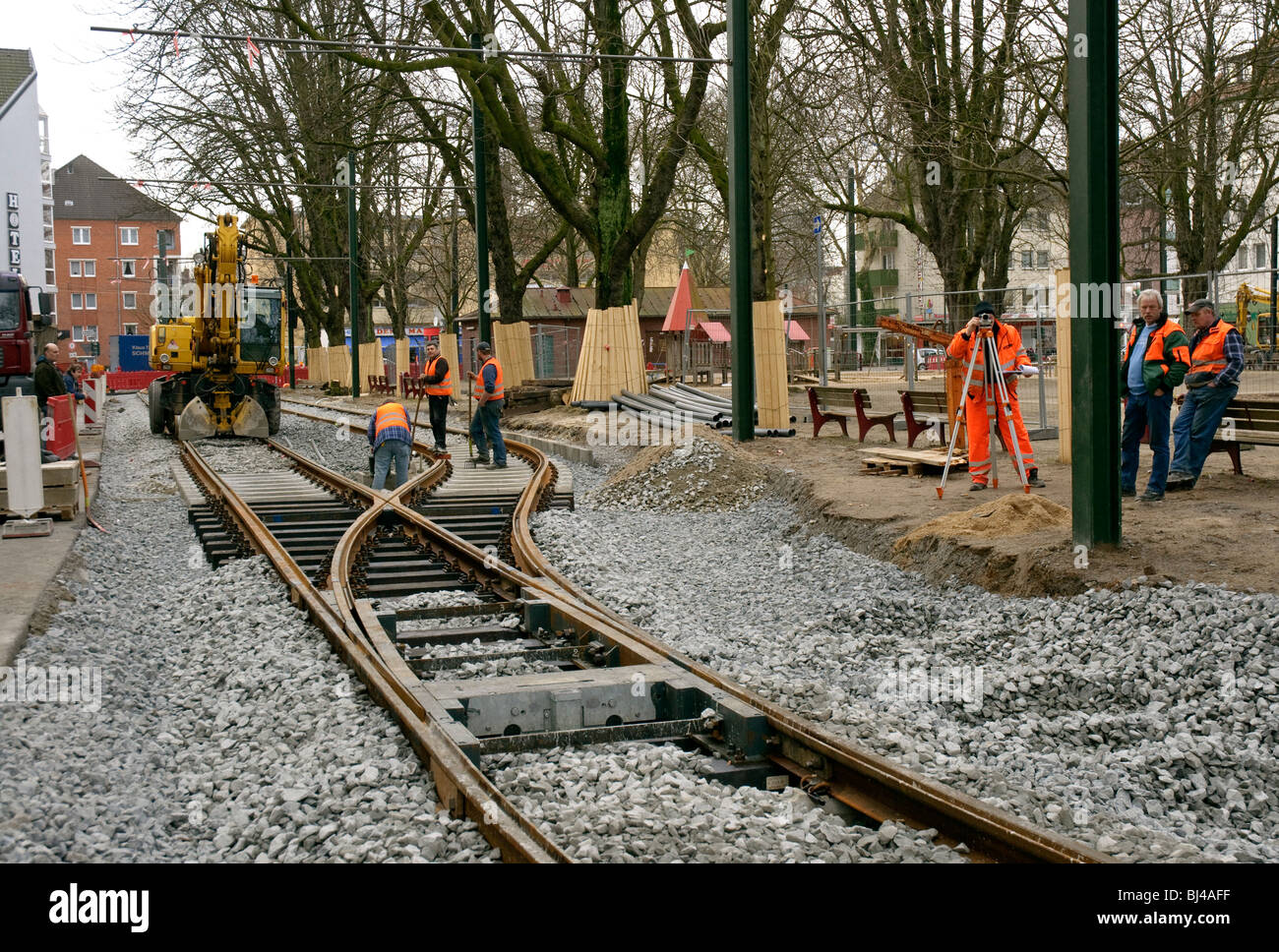 Contractors laying tracks at Spichernplatz on the Düsseldorf tramway system, Germany. Stock Photo