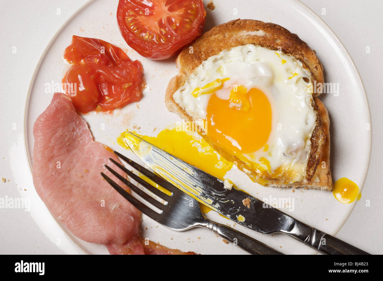 Half-eaten English breakfast Stock Photo