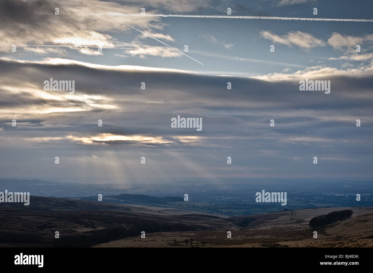 Rays of sunshine filtering through the clouds. Wheelton Moor and Great Hill, near Brinscall, Chorley, Lancashire   Stock Photo