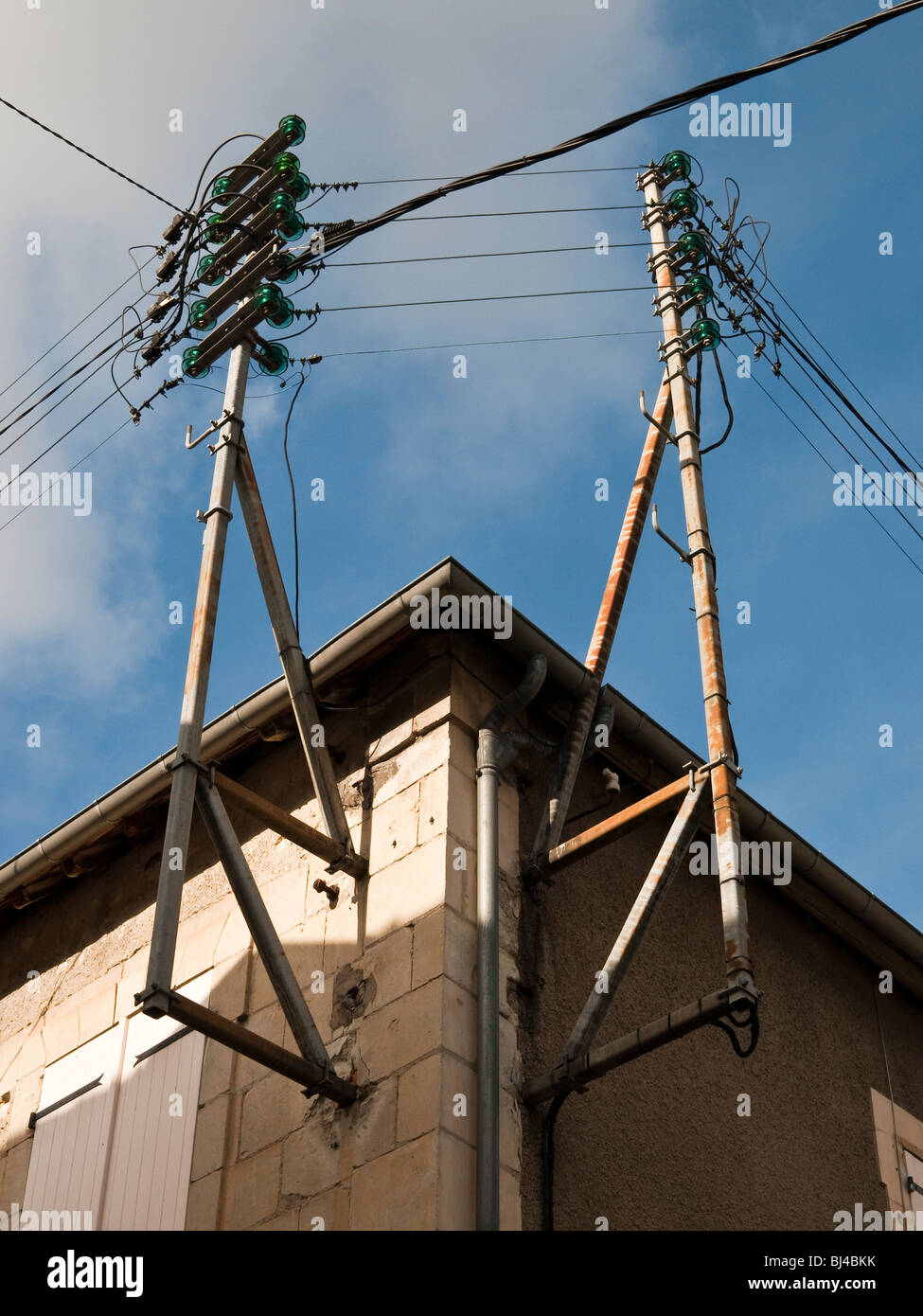 Old domestic mains electricity supply posts France Stock Photo Alamy