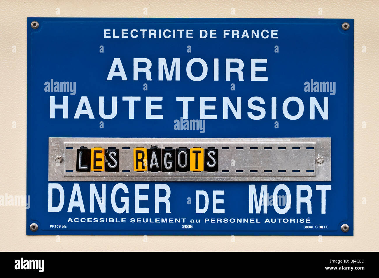 Warning notice at electricity sub-station - France. Stock Photo